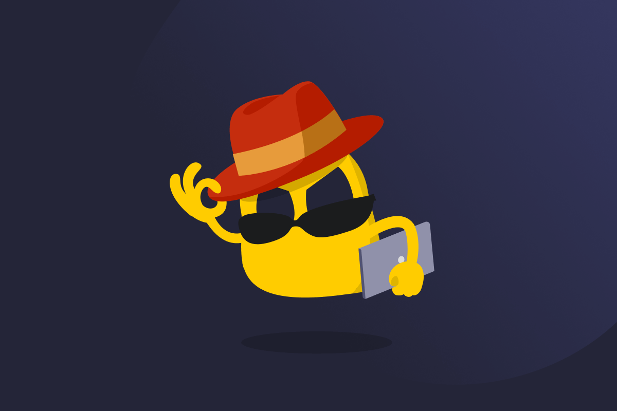 A yellow Ghostie figure making the okay sign, wearing a red hat against a black background.